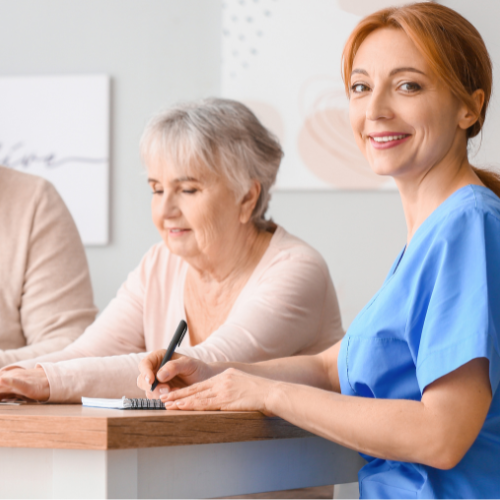 two seniors with a nurse
