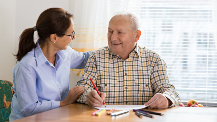 an adult doing activities with his caregiver