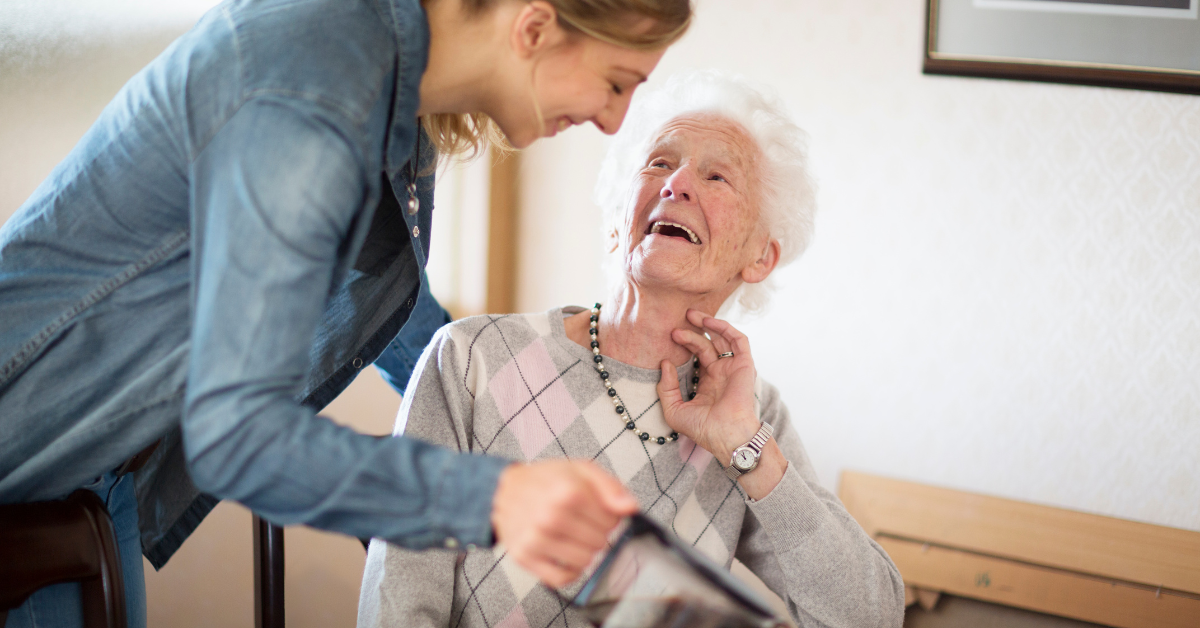 old lady with caregiver