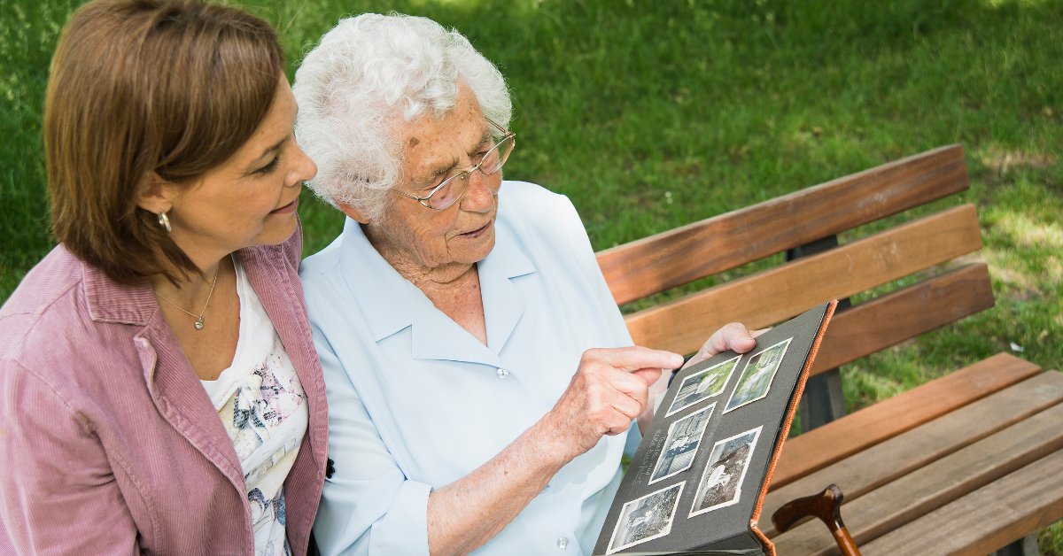 a senior lady with her caregiver at memory care